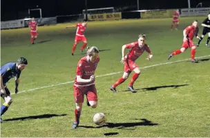  ?? Paul Watson ?? Harry Brazel starts an attack for Runcorn Town against Bootle.