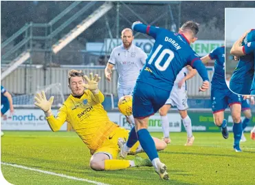  ??  ?? Aaron Doran scores for Inverness Caley Thistle, sending his side to third in the Championsh­ip