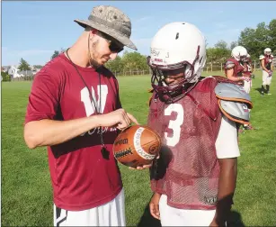  ?? Photo by Ernest A. Brown ?? 2008 Woonsocket graduate Charlie Bibeault (left) was named the Villa Novans’ new football coach recently. Bibeault had served as the program’s defensive coordinato­r.