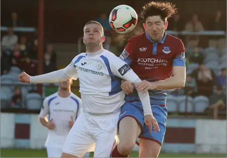  ??  ?? Danny Morrissey of Finn Harps and Ciaran McGuigan of Drogheda United.