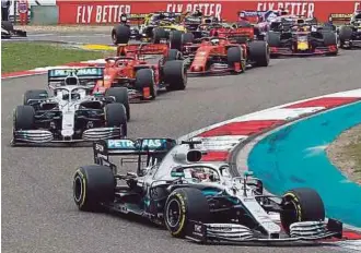  ?? EPA PIC ?? Mercedes AMG Petronas’ Lewis Hamilton leads the pack at the start of the Chinese Grand Prix at the Shanghai Internatio­nal Circuit yesterday.