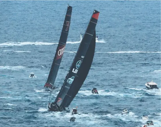  ?? Picture: GETTY IMAGES ?? Wild Oats XI and Comanche race out of Sydney Harbour yesterday after the start of the Sydney to Hobart yacht race.