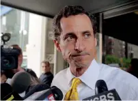  ?? AFP file ?? Weiner leaves his apartment building in New York. —