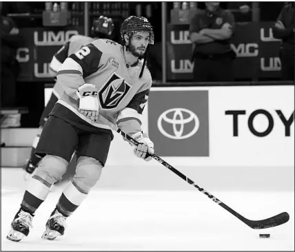  ?? STEVE MARCUS / SUN FILE (2022) ?? Vegas Golden Knights forward Gage Quinney warms up at T-mobile Arena before an NHL preseason game against the Colorado Avalanche on Sept. 28, 2022. Quinney and his wife have been lending a hand at the of Henderson Animal Care and Control facility.