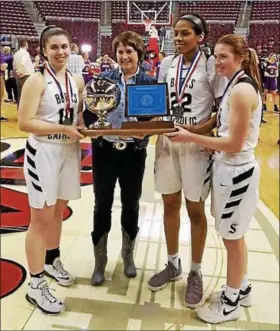  ?? COURTESY BERKS CATHOLIC ATHLETICS ?? Berks Catholic players Abigail Gaffney, left, Dejah Terrell, second from right, and Molly Duncan, right, receive the PIAA runner-up trophy after the PIAA 4A championsh­ip game on March 28 in Hershey.
