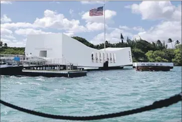  ?? Caleb Jones Associated Press ?? CRACKS ON the outside of the memorial were noticed on May 6. “The structure is not supporting the loading ramp the way that we need,” says Jay Blount of the World War II Valor in the Pacific National Monument.