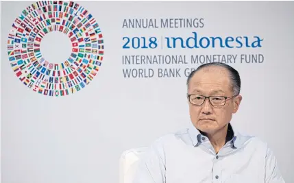  ?? EPA ?? President of the World Bank Group Jim Yong-kim looks on during the Trade Conference introducti­on at the Internatio­nal Monetary Fund and World Bank annual meeting in Indonesia in October.