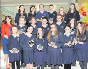  ??  ?? Students of St. Mary's Secondary School Charlevill­e who received awards pictured with Principal Ann Doherty, who was stepping down from her position, at the annual awards ceremony.