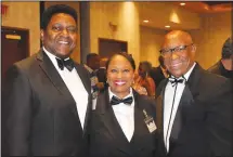  ?? (NWA Democrat-Gazette/Carin Schoppmeye­r) ?? Victor and Monica Wilson (from left) visit with Dr. John L Colbert at the Celebrity Waiter benefit where Colbert was named a “Difference Maker” as “the first African American superinten­dent of Fayettevil­le Public Schools.”