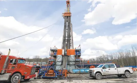  ?? KEITH SRAKOCIC/AP FILE PHOTO ?? In this file photo from March 12, work continues at a shale gas well drilling site in St. Mary’s.