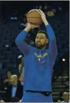  ?? JANE TYSKA — BAY AREA NEWS GROUP, FILE ?? The Warriors’ Klay Thompson warms up before their game against the Magic in November 2018. The shooting guard is recovering from a torn ACL.