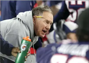  ?? Photo by Louriann Mardo-Zayat / lmzartwork­s.com ?? Patriots coach Bill Belichick won his 250th game as the team’s coach – and his 287th win overall – after New England downed Minnesota 24-10 Sunday at Gillette Stadium.