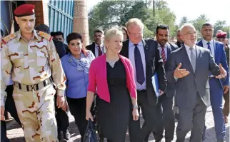  ?? – Reuetrs ?? WARM WELCOME: Iraq’s Foreign Minister Ibrahim Al Jaafari, second right, welcomes Sweden’s Foreign Minister Margot Wallstrom, centre, and Sweden’s Defence Minister Peter Hultqvist, fourth right, in Baghdad, Iraq on Monday.