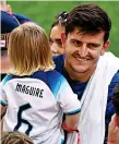  ?? GETTY IMAGES ?? Post-match hug: Maguire with his family