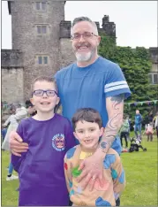  ?? (Pic: John Ahern) ?? Local man, Paul Fitzgerald, who brought his sons, Eli and Seth to the Towers & Tales Children’s Book Festival in Lismore last Saturday.