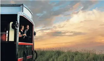  ?? Picture: photos.rovos.co.za ?? ROMANCE ON THE RAILS A happy couple on the Rovos..