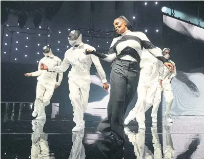  ?? Janet Jackson performs in Florida in April (photos weren’t allowed at her Toronto show). There were some issues with the sound mix and her choreograp­hy wasn’t as strenuous as past tours, but she delivered the goods, Nick Krewen writes. KEVIN MAZUR GETTY I ??