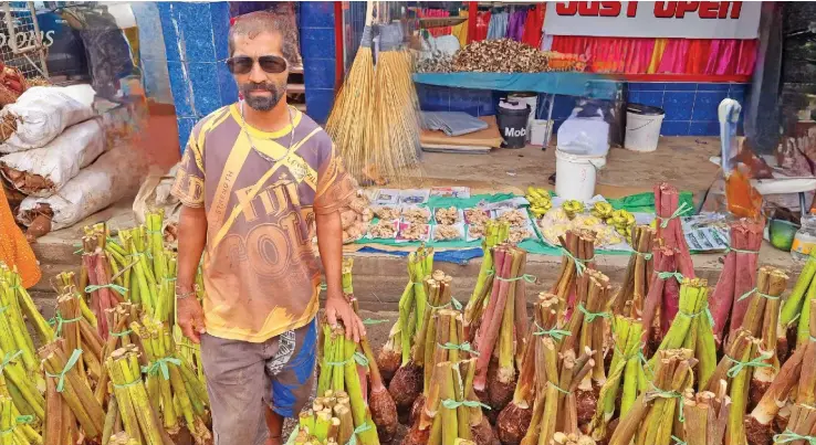  ?? Sampras Anand ?? Root crop and vegetable farmer, Atish Kumar, 38, made the long journey from Savusavu to Labasa Market to sell his produce and generate maximum income. Photo: