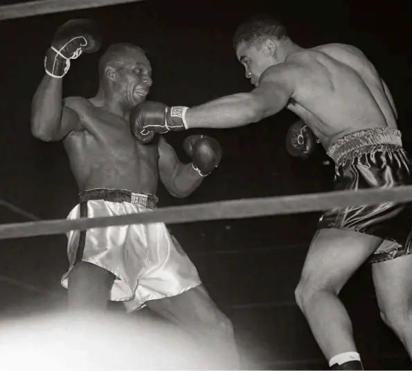  ??  ?? FIGHTING BACK: Louis attacks Walcott but almost all observers believe he’s lost at the final bell Photos: AP/SHUTTERSTO­CK