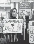  ?? JUSTIN TALLIS, AFP/ GETTY IMAGES ?? Protest outside the French Embassy in London on Friday.