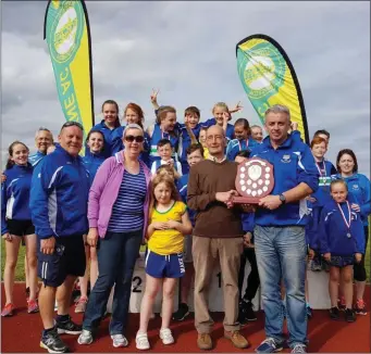  ??  ?? Derek Gillespie collects the Pat Walker Memorial Shield for best visiting club, on behalf of Ardee &amp; District AC, at the Boyne Sports Day on Sunday.