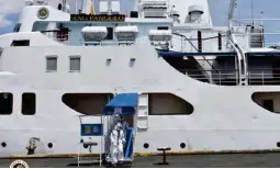  ??  ?? sAFE hARBoR A passenger vessel courtesy of 2go became a floating quarantine facility for returning oFWs (Photo from Philippine coast guard)