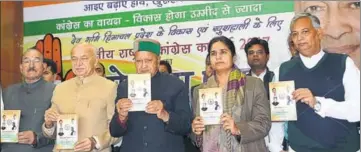  ?? PTI ?? HP chief minister Virbhadra Singh (centre) along with other senior Congress leaders during the release of party’s manifesto for the November 9 assembly polls, in Shimla on Wednesday.