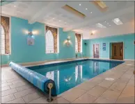  ?? ?? The home includes a heated swimming pool