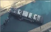  ?? ©MAXAR TECHNOLOGI­ES VIA AP ?? The cargo ship MV Ever Given stuck in the Suez Canal near Suez, Egypt, Friday.