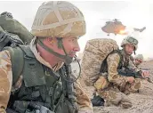  ?? ?? Royal Marines in Iraq during Operation Telic in the first days of the war