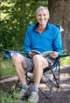  ?? Chris Weidner / Courtesy Photo ?? Jonathan Lagoe takes a rest day in camp at Rifle Mountain Park over Fourth of July weekend this year.