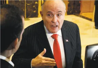  ?? Evan Vucci / Associated Press 2017 ?? Rudy Giuliani says President Trump’s payment to a porn star was a personal legal matter.