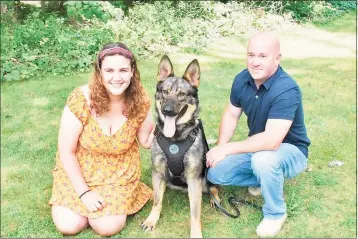  ?? Brittany Murphy / Contribute­d photos ?? Brittany Murphy, left, of West Haven; with Portland police dog Magnus and Sgt. Jim Kelly. Murphy raised $1,200 to get a bulletproo­f vest for Magnus.