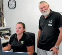  ??  ?? Taranaki Federated Farmers president, Donald McIntyre, checks on federation matters with Jessie Waite, office manager in New Plymouth.