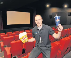  ??  ?? In the picture Cinema worker Aivars Pukitis in the new refurbishe­d screen three