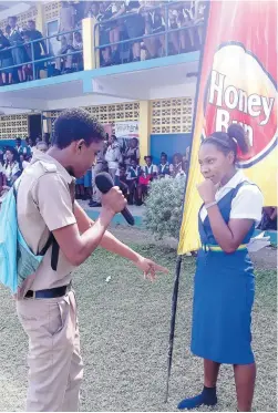  ??  ?? Honey Bun jingle competitor sings to a blushing colleague, creating waves of appeal.