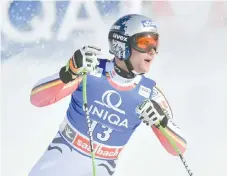  ?? - AFP photo ?? Dressen denies Feuz in Saalbach downhill.