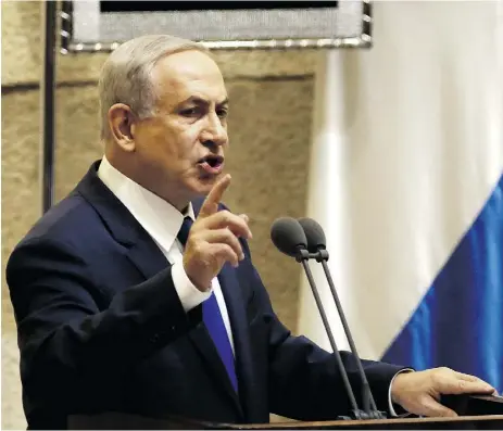  ?? GALI TIBBON / AFP / Gett y Imag es ?? Israeli leader Benjamin Netanyahu said “knife terror will not defeat us” as he addressed parliament Sunday.