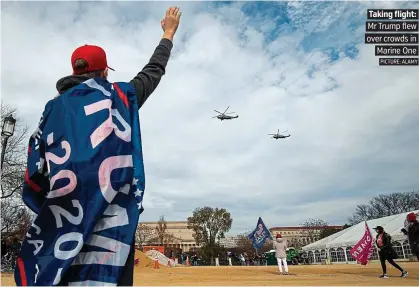  ?? PICTURE: ALAMY ?? Taking flight: Mr Trump flew over crowds in Marine One