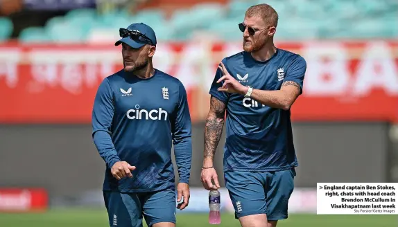  ?? Stu Forster/Getty Images ?? England captain Ben Stokes, right, chats with head coach Brendon McCullum in Visakhapat­nam last week