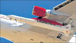  ?? REUTERS ?? A view of Richard Branson's Virgin Orbit, with a rocket underneath the wing of a modified Boeing 747 jetliner, during the launch of its high-altitude launch system for satellites.