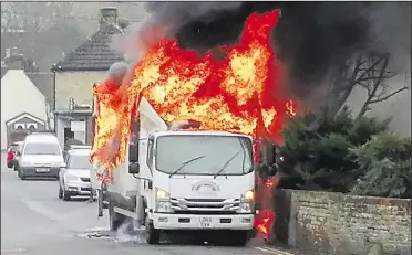  ??  ?? The lorry caught fire close to the level crossing in Chartham