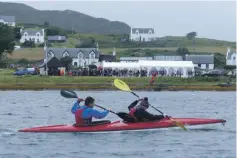  ??  ?? Senior mixed doubles winners Rachael Haylett and Tim White cross the finishing line.