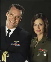  ?? ?? David James Elliot and Catherine Bell in “JAG.” PHOTO COURTESY CBS