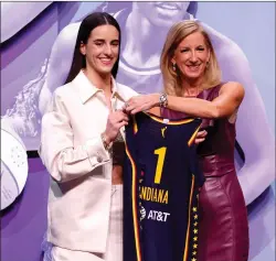  ?? Tribune News Service ?? Caitlin Clark poses with WNBA Commission­er Cathy Engelbert after being selected as the first overall pick by the Indiana Fever during the 2024 WNBA draft at Brooklyn Academy of Music on Monday.