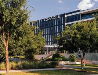  ?? Ilana Panich-Linsman ?? Oracle’s Austin campus is among company headquarte­rs based in the Texas capital as firms from California flock to Texas seeking lower taxes and utility costs, among other things.
