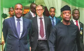  ?? AFP ?? Nigerian Vice-President Yemi Osinbajo (second from right), Nigerian billionair­e Aliko Dangote (left), and Microsoft founder Bill Gates (centre) arrive for the closing ceremony of the National Economic Council (NEC) in Abuja on March 22.