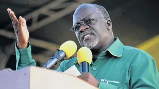  ?? /Reuters ?? Cracking the whip: President John Magufuli is overhaulin­g the fiscal and regulatory regime of Tanzania’s mining sector so that the country can benefit more from its mineral wealth.