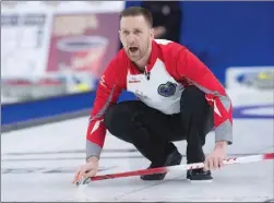  ?? The Canadian Press ?? Newfoundla­nd and Labrador skip Brad Gushue calls the sweep against Nova Scotia in draw 17 action at the Tim Hortons Brier in St. John’s, N.L., on Friday.