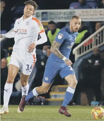  ??  ?? Marcus Maddison in action for Posh against Luton in the Checkatrad­e Trophy.